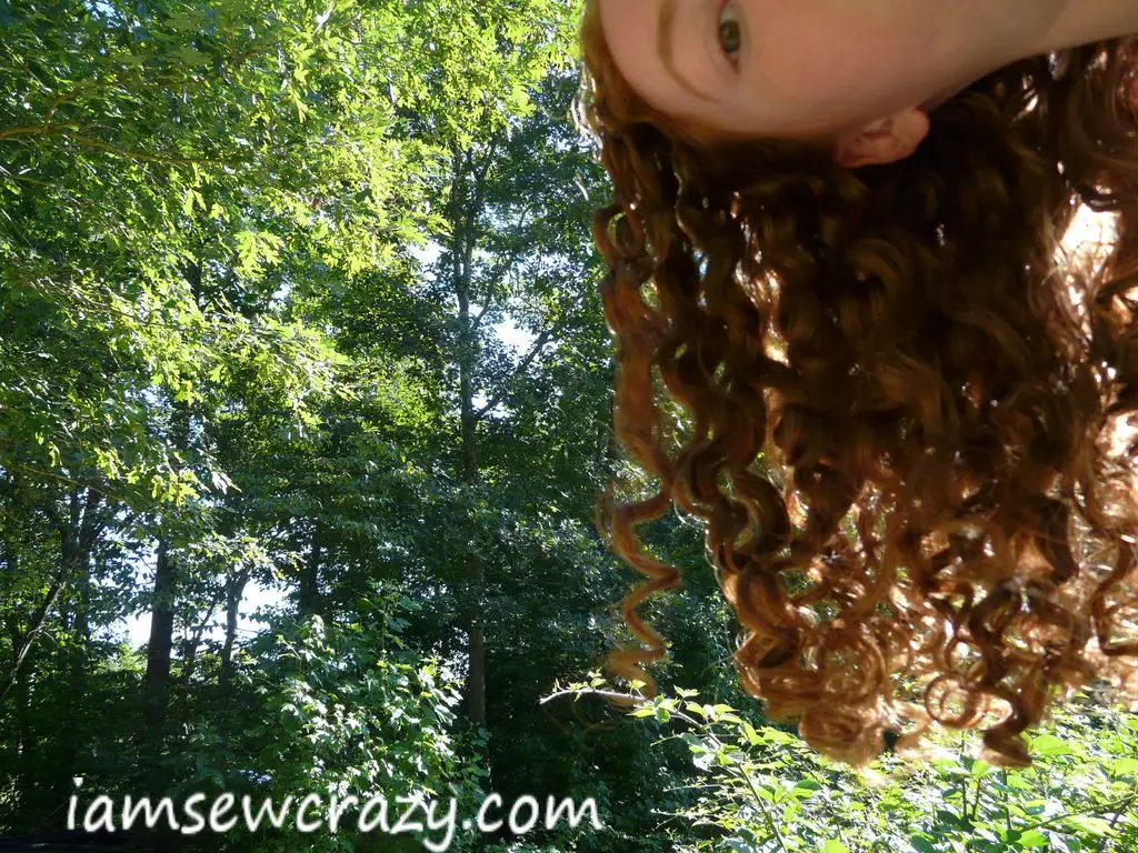 Red curly hair in the sunlight