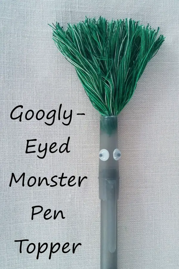 Googly-eyed monster pen topper