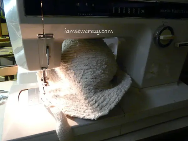 hat squashed under the sewing machine