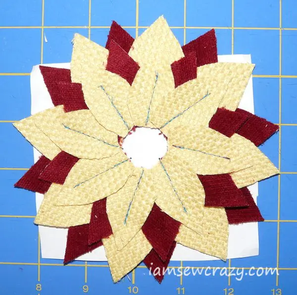 top layer of petals sewn to fabric flower