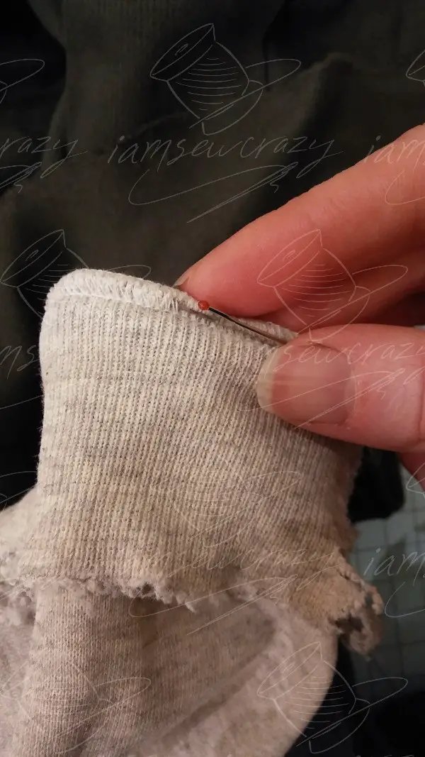 cutting worn cuffs off sweatshirt