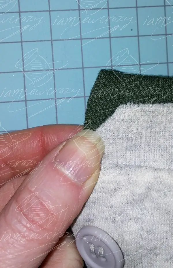 folding under worn corner of sweatshirt collar