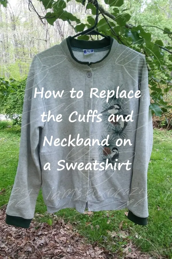 gray sweatshirt with dark green cuffs with text overlay: how to replace the cuffs and neckband on a sweatshirt