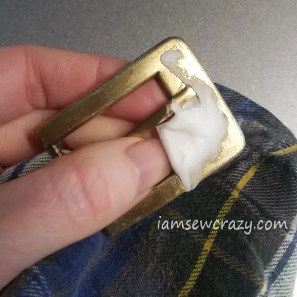 polishing a belt buckle using toothpaste