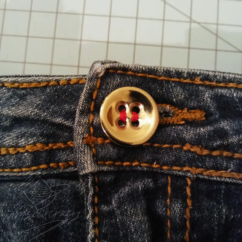 new jeans button sewn on