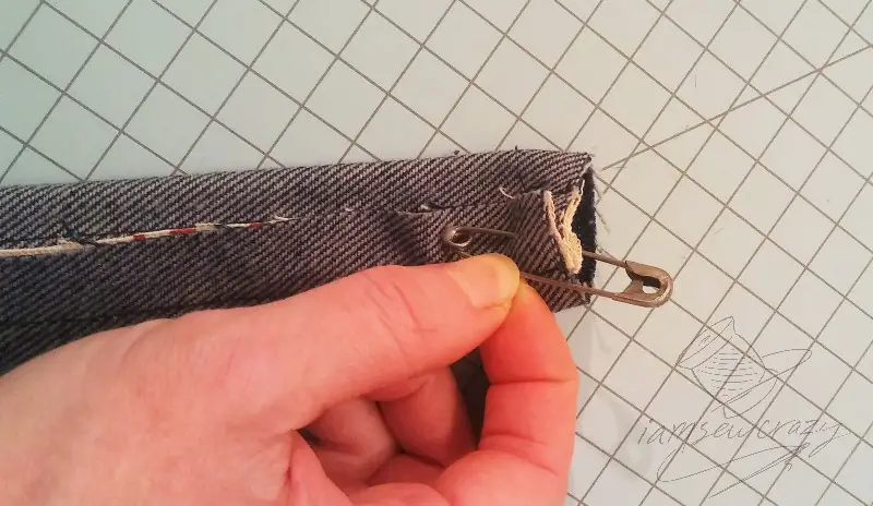 safety pin on fabric tube