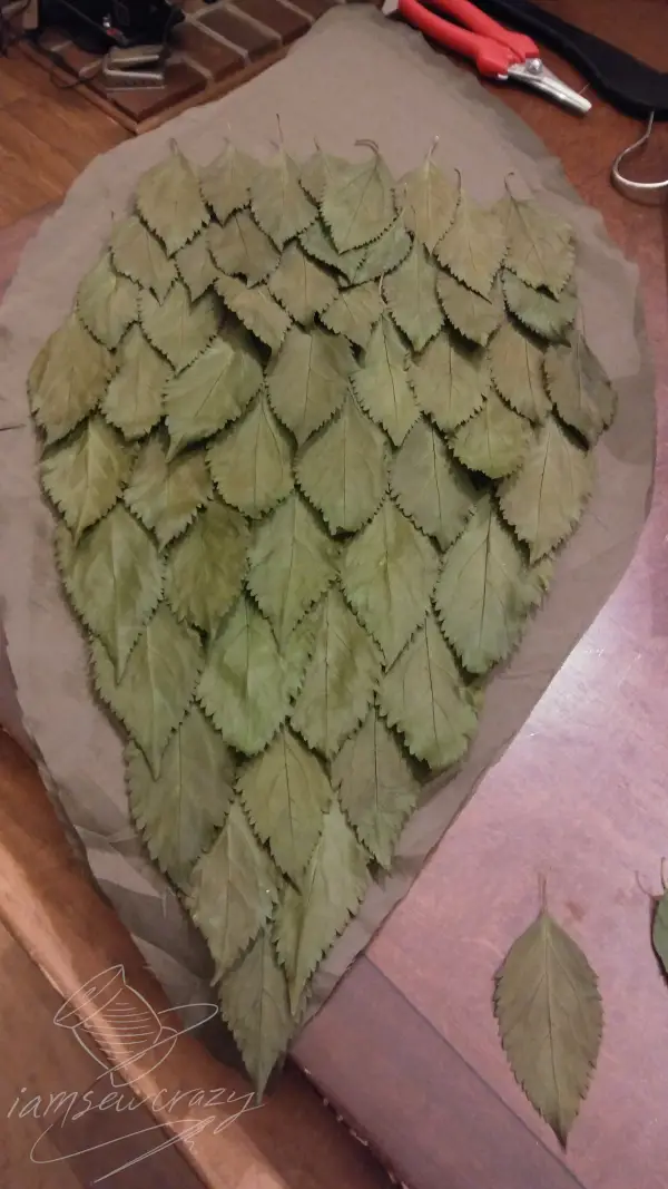 covering DIY fairy wings with leaves