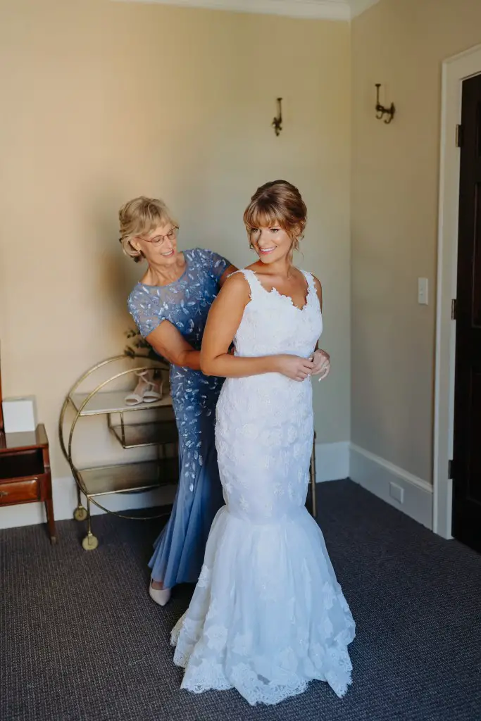 bride wearing mother's restyled wedding dress