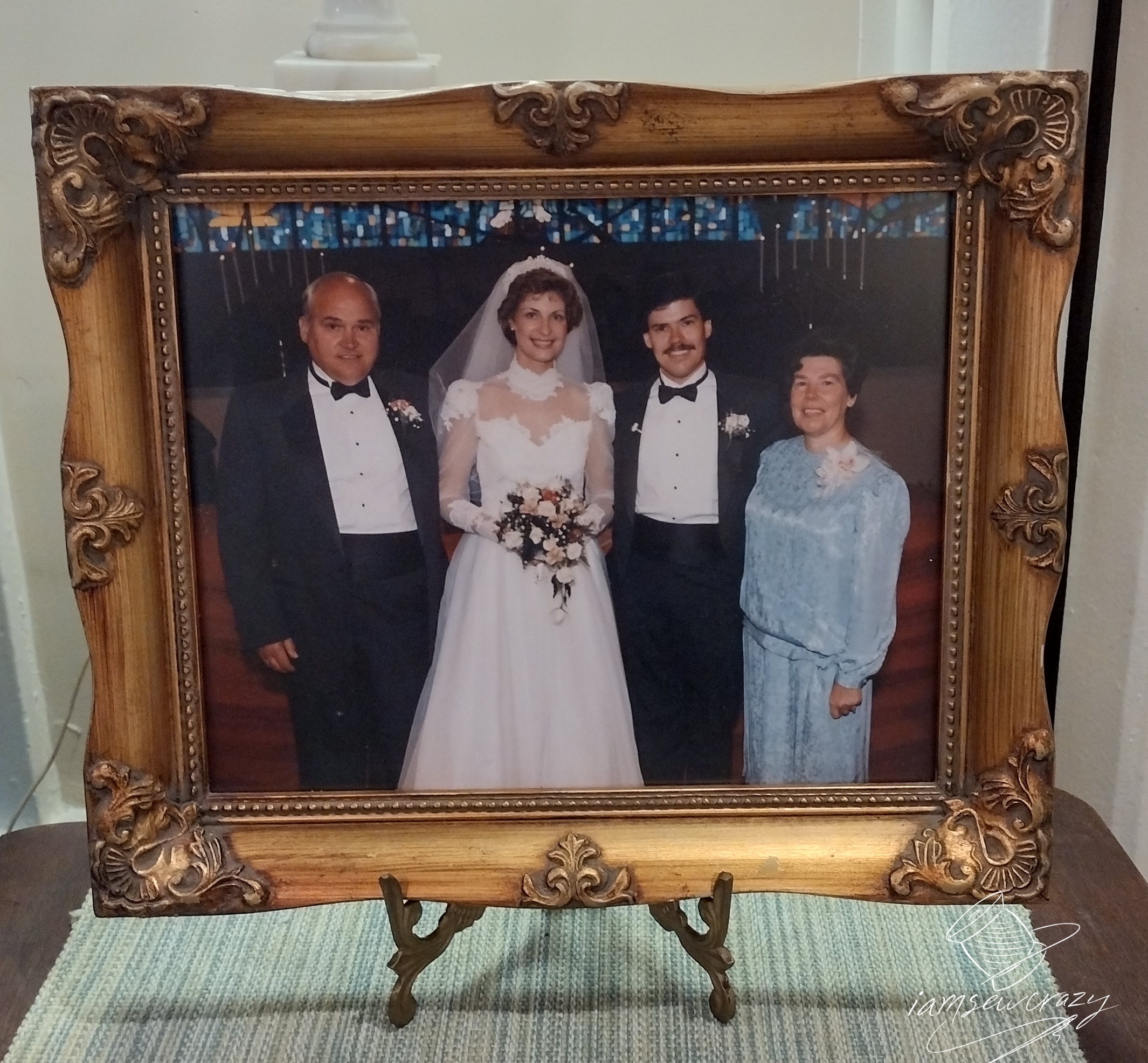 photo of bride wearing vintage wedding dress and veil