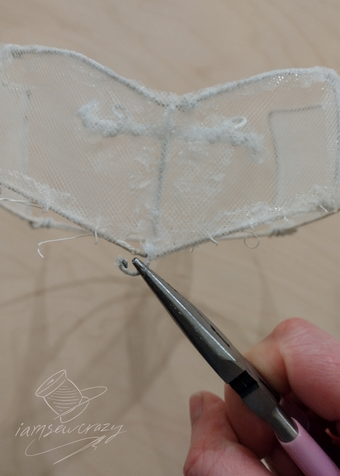 taking apart a wedding veil to restyle it