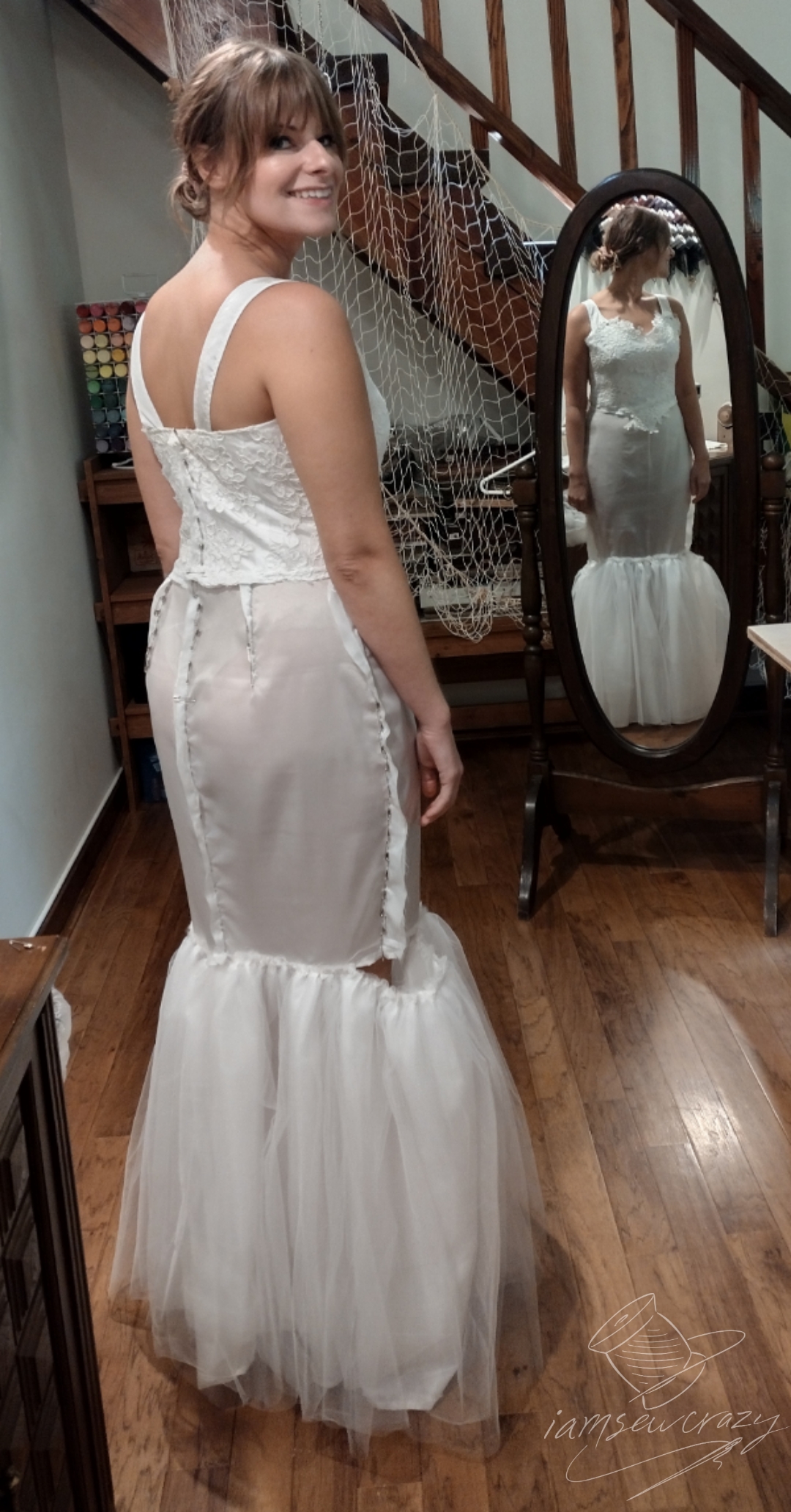 bride trying on restyled vintage wedding dress