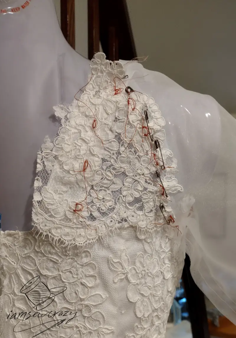using tailor's tacks to mark wedding dress sleeve