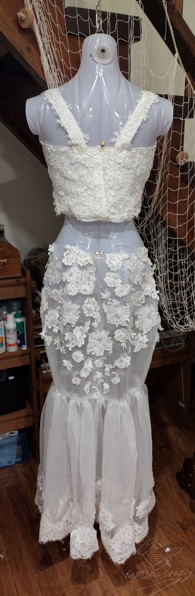 designing a lace-covered wedding dress