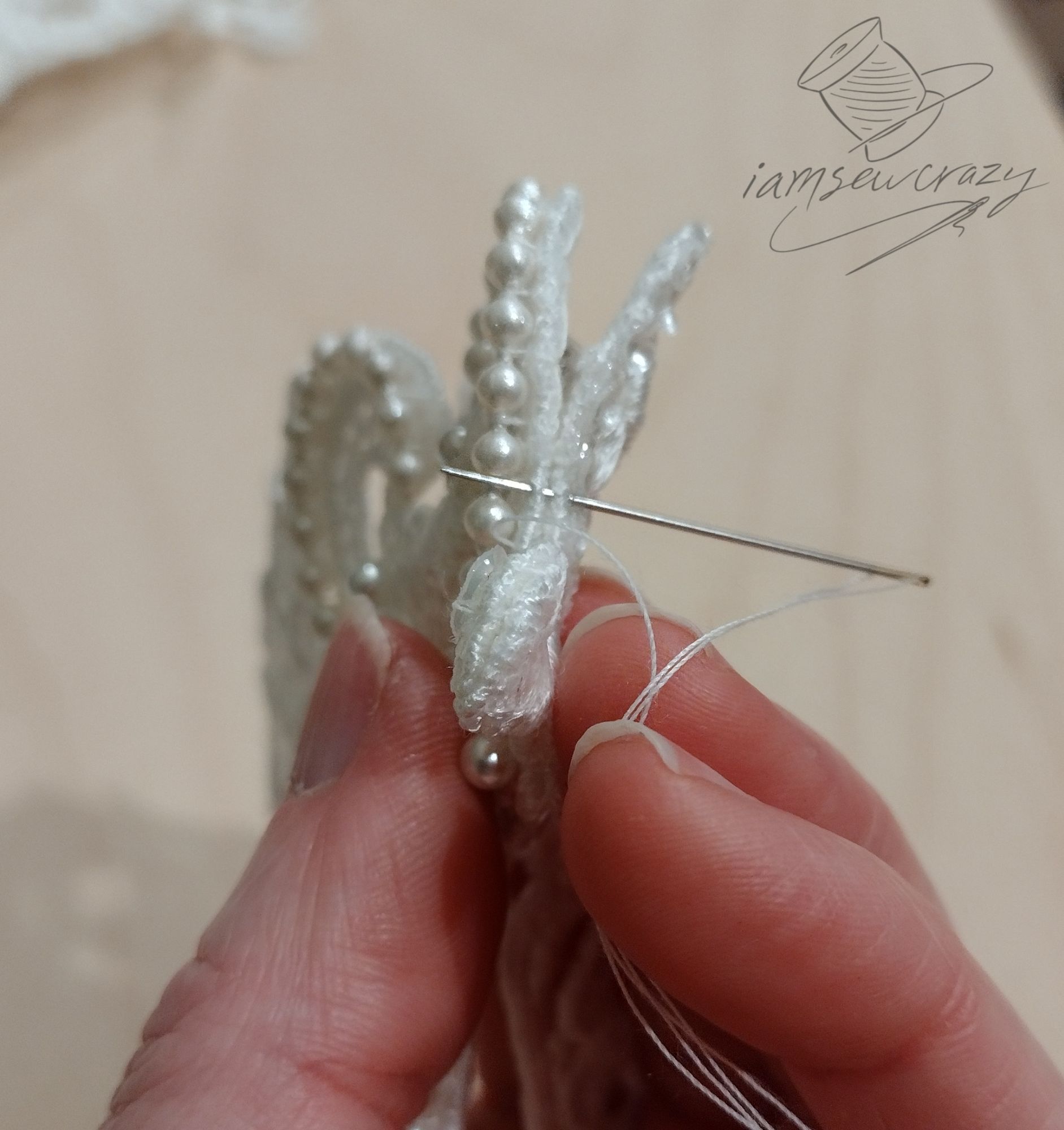 sewing a wedding fascinator together