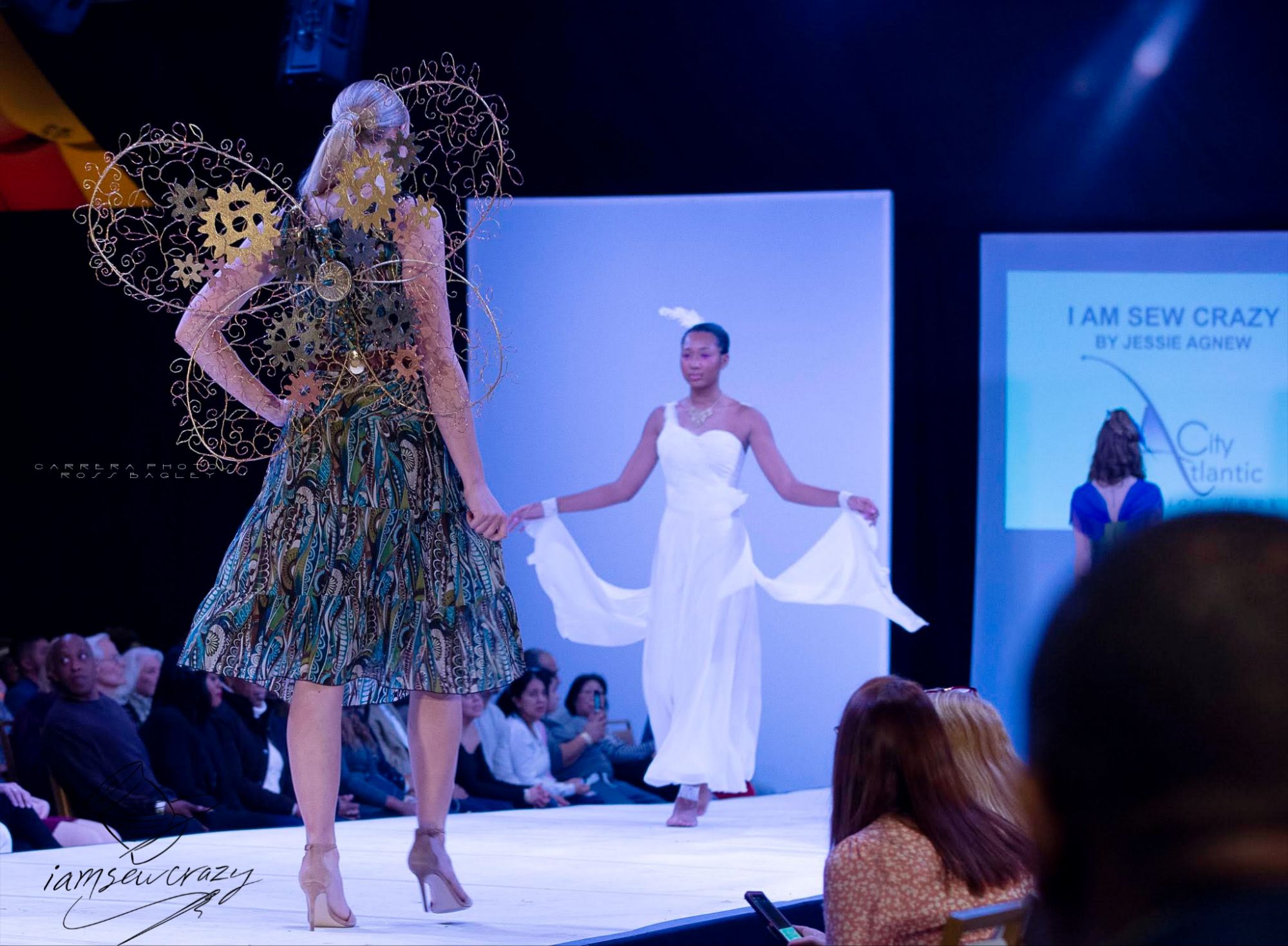 steampunk butterfly wings on a fashion show runway